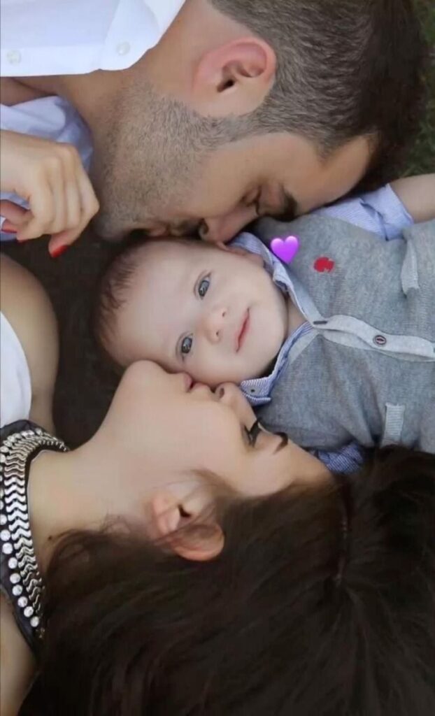 Mother holding her newborn baby close, capturing a heartwarming moment of love.