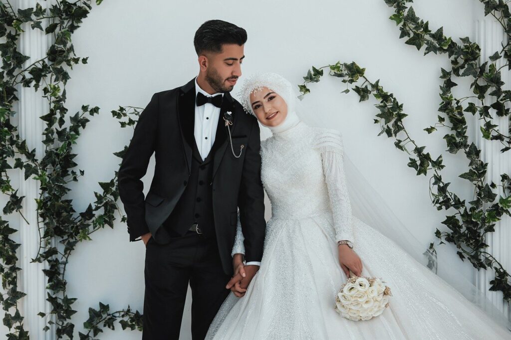 "Bride and groom performing rituals in a traditional wedding ceremony."